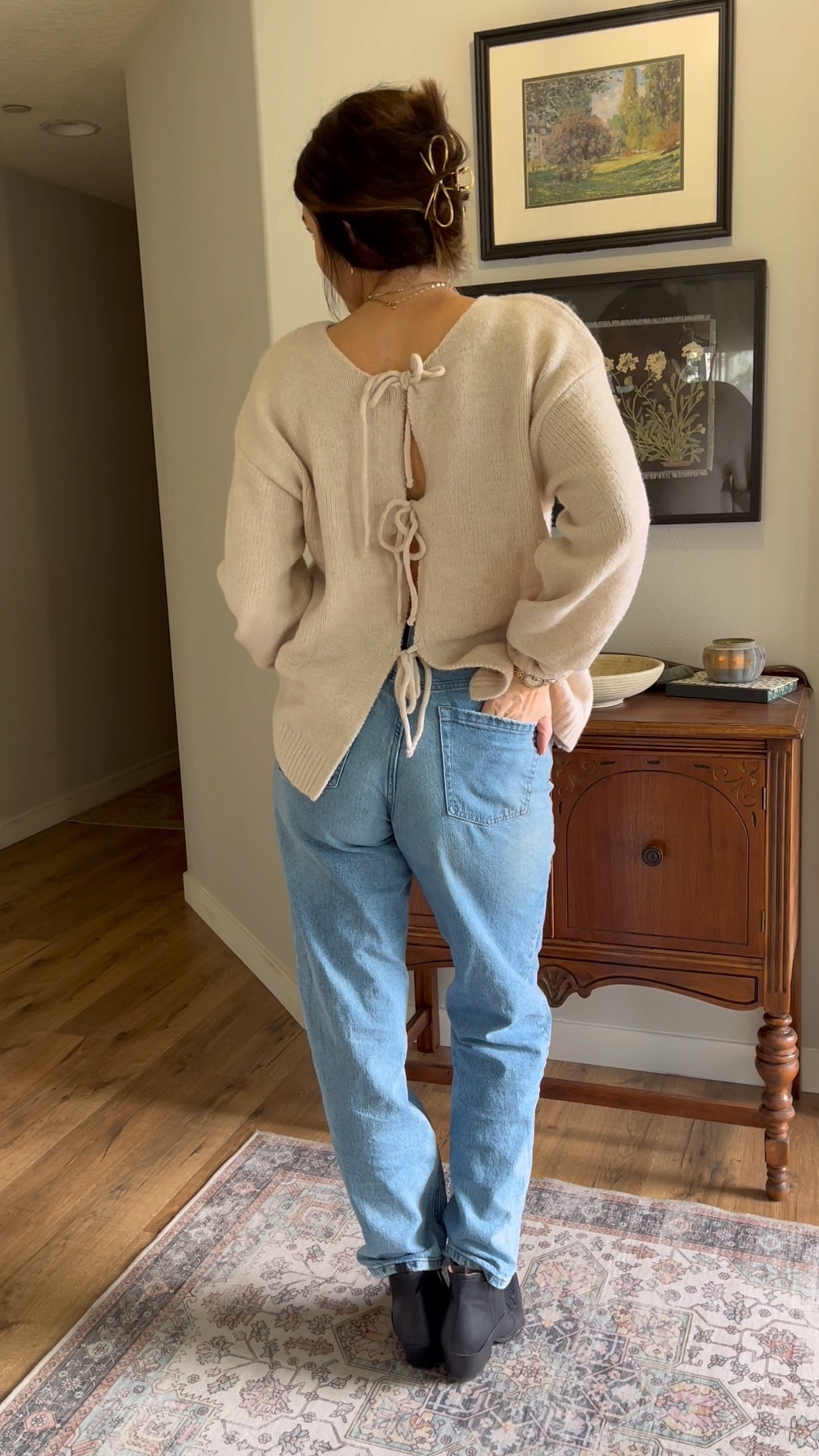 Viral bow sweater- worn backwards! So flirty and fun! 

*linked some cute similar boots!

#LTKStyleTip #LTKFindsUnder50 #LTKMidsize