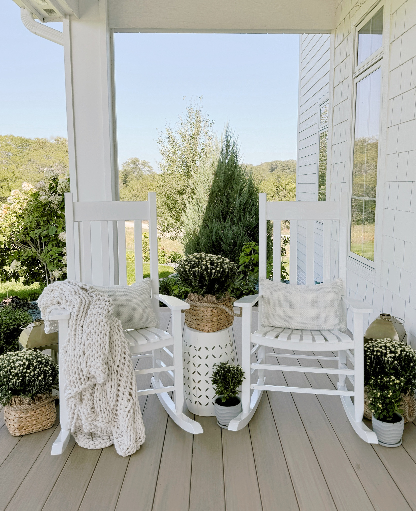 #ad Labor Day sales at @loweshomeimprovement are now live! I love decorating my front porch with mums for fall, and these are currently on sale!  It’s $5 for the 3 qt mums and $2.50 for 1 qt mums.  I like to keep my front porch neutral, so I always go with white mums and eventually will add white pumpkins. I’ve linked the rocking chairs, mums, and planters, and make sure you check out the other Labor Day savings being offered! #lowespartner