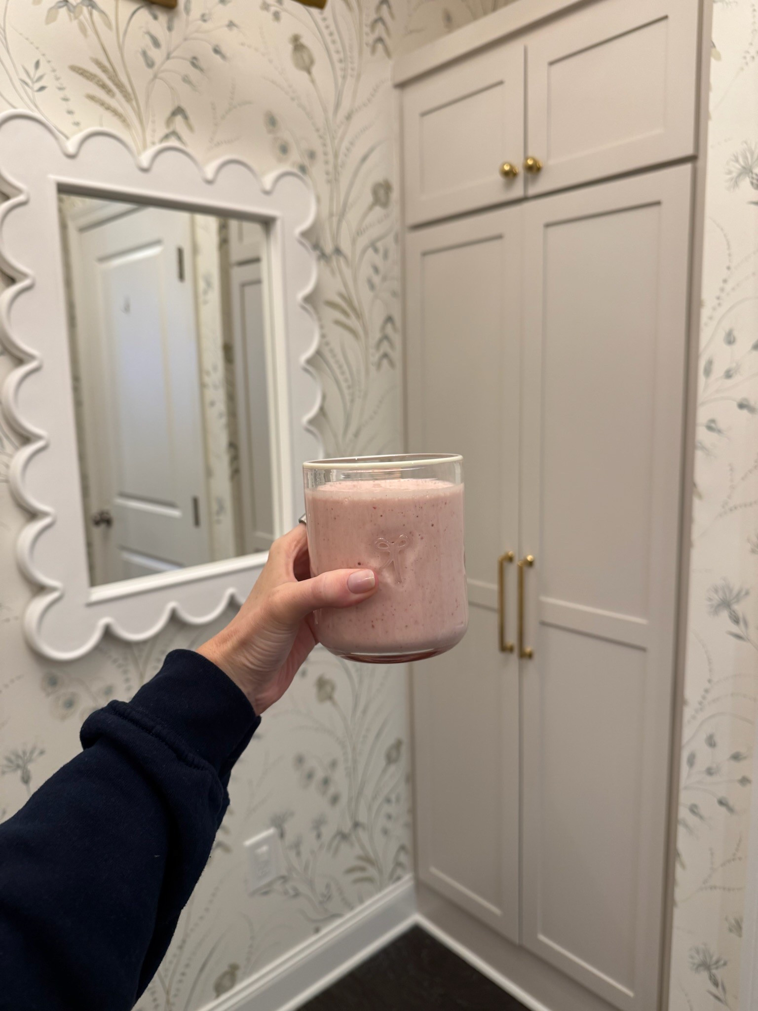 Drinking a smoothie out of one of my favorite glasses from Anthropologie! This glass has bows on it, but there are multiple designs. Would make the cutest gift. Home products // kitchen products // drink glasses // bow glasses // gift ideas // Anthro finds 

#LTKHome #LTKSeasonal #LTKFindsUnder50