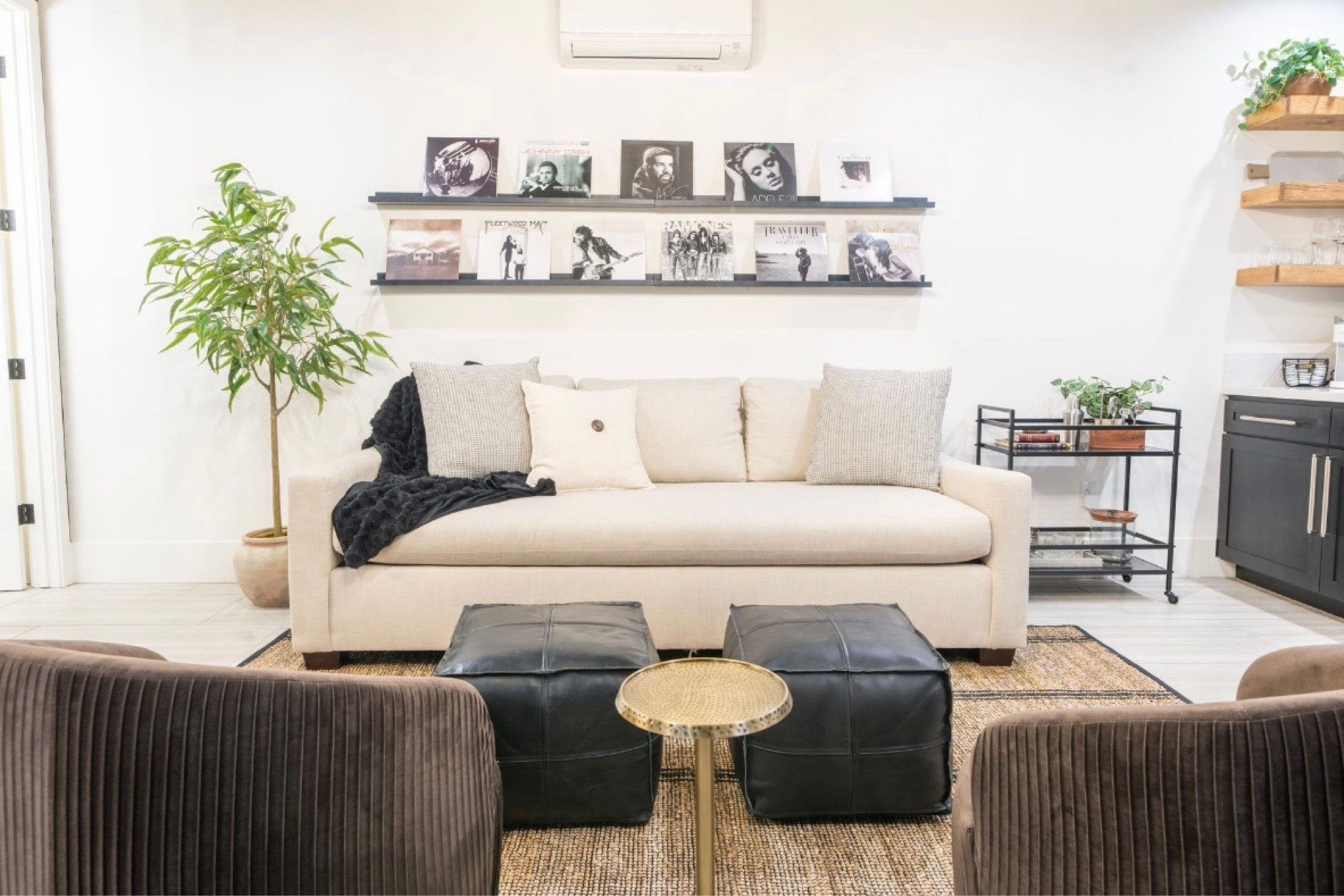 Refresh on the casita! 

We used 4 shelves to hold the records. 

Pillows were a home goods find.
Bar cart and accessories are linked in previous post. 

#LTKstyletip #LTKtravel #LTKhome