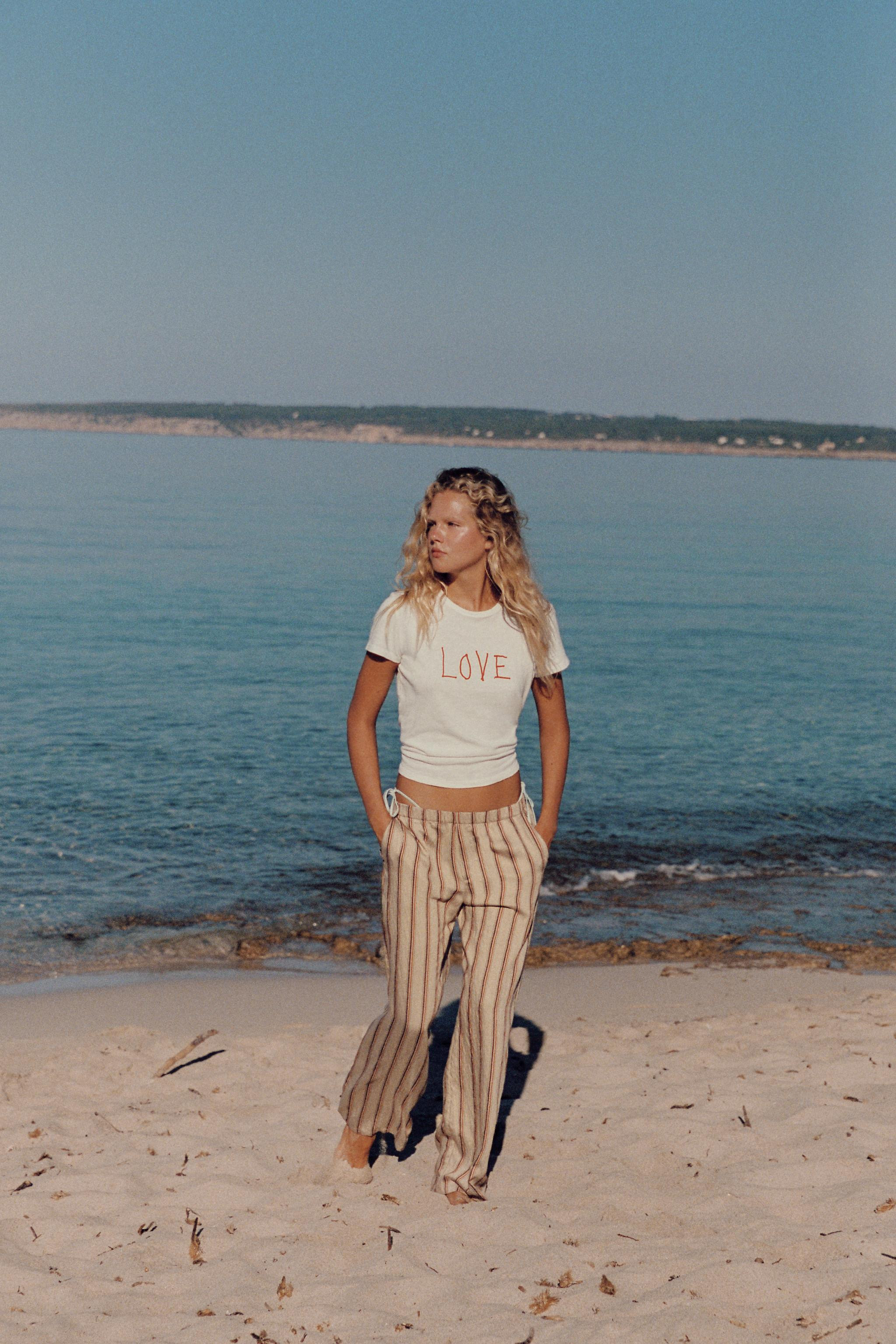 STRIPED FLOWING TROUSERS | Zara UK