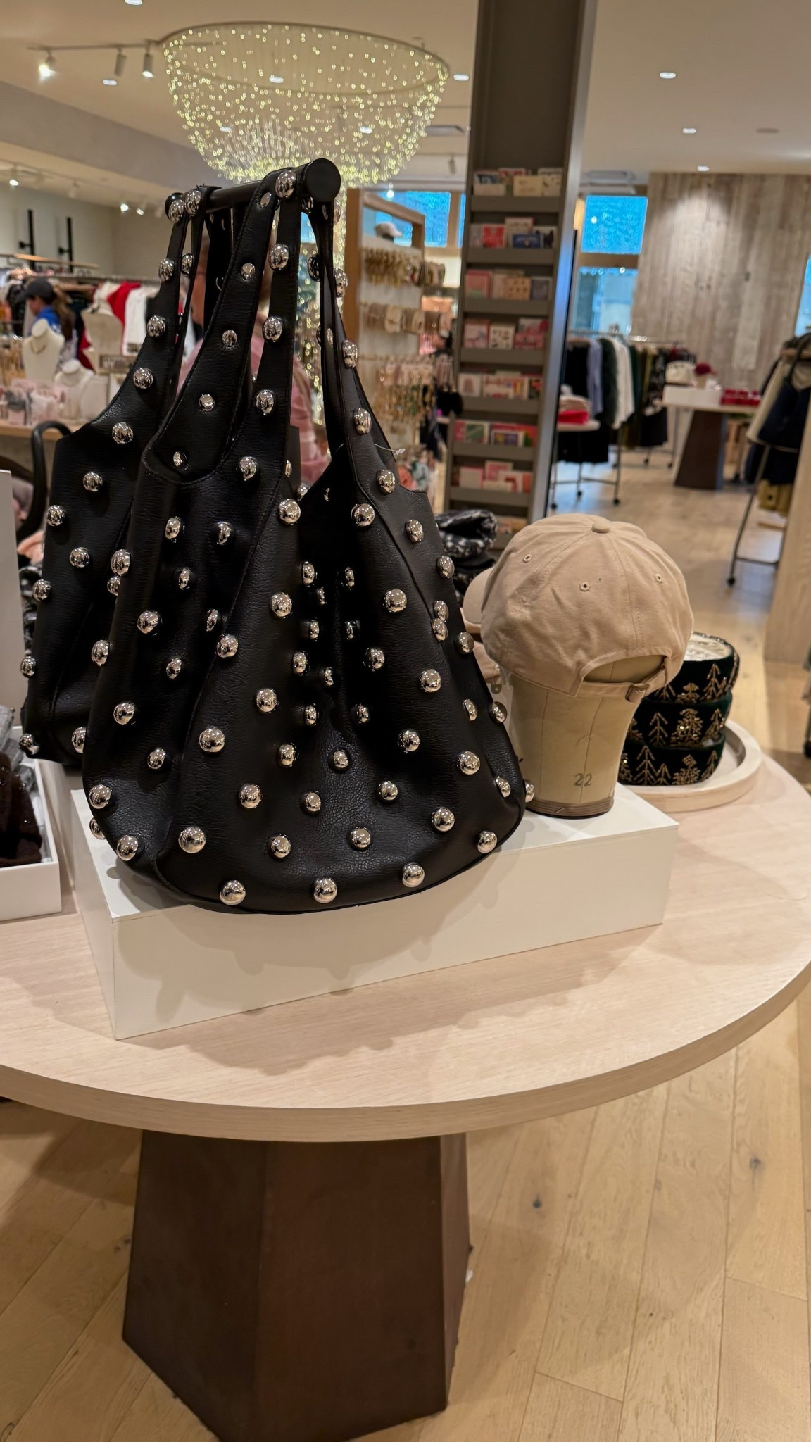 Black leather tote bag with large silver studs!

#LTKWorkwear