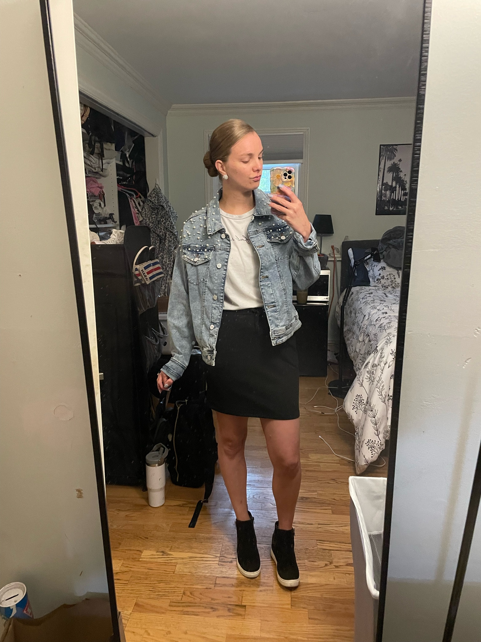 Pearl denim jacket, black mini skirt, platform sneakers, white graphic tee, silver earrings 