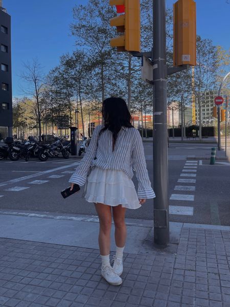 Stripe shirt 
Ruffle skirt
Socks and trainers 
Spring outfits 
Metallic bag 

#LTKshoecrush #LTKeurope #LTKstyletip