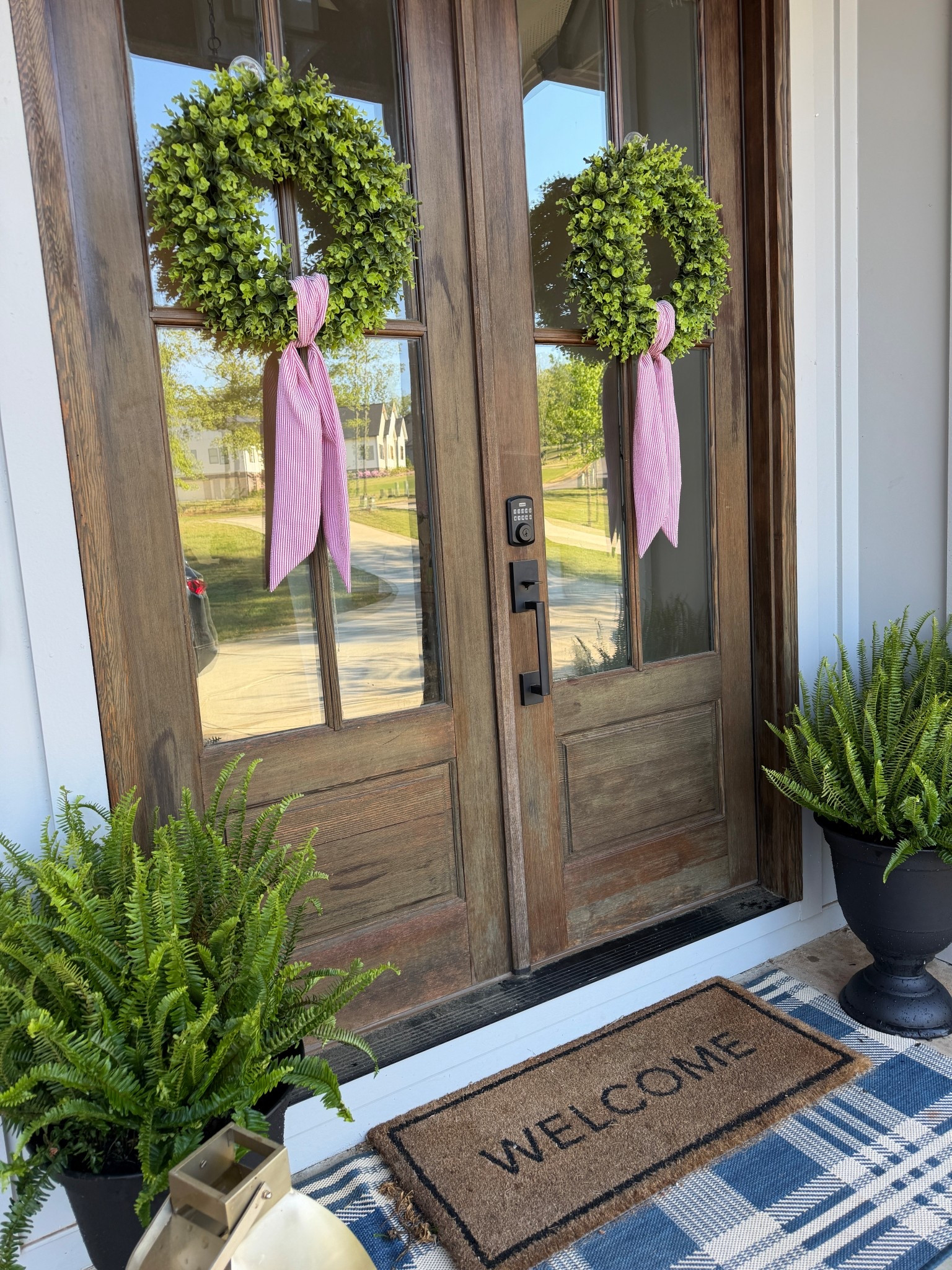 Front porch summer decor for under $18!! These planters that my ferns are in are $16 each and my wreath sashes were eight dollars for a pack of two!🤍💐☀️

#LTKHome #LTKSeasonal