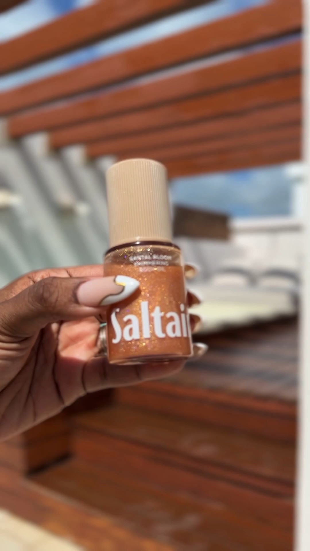 This shimmer body oil and fragrance is perfect combo for beach or pool this summer! @ULTA Beauty @Salt & Stone

#LTKSwim #LTKBeauty #LTKPlusSize