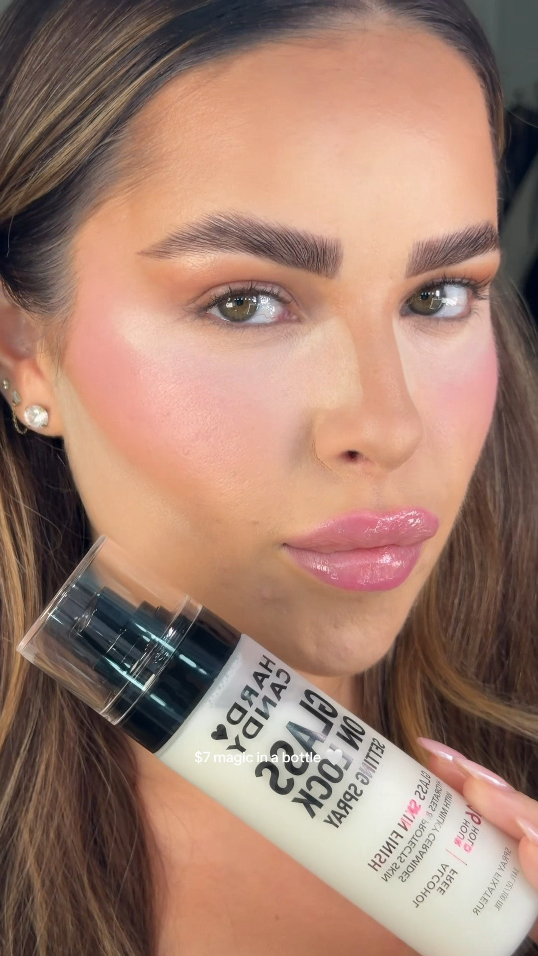 the glow this gives your skin for only $7 is crazy 👀 @Hard Candy glass on lock setting spray #powdermelt #settingspray #makeuphacks #glowymakeup #drugstoremakeup