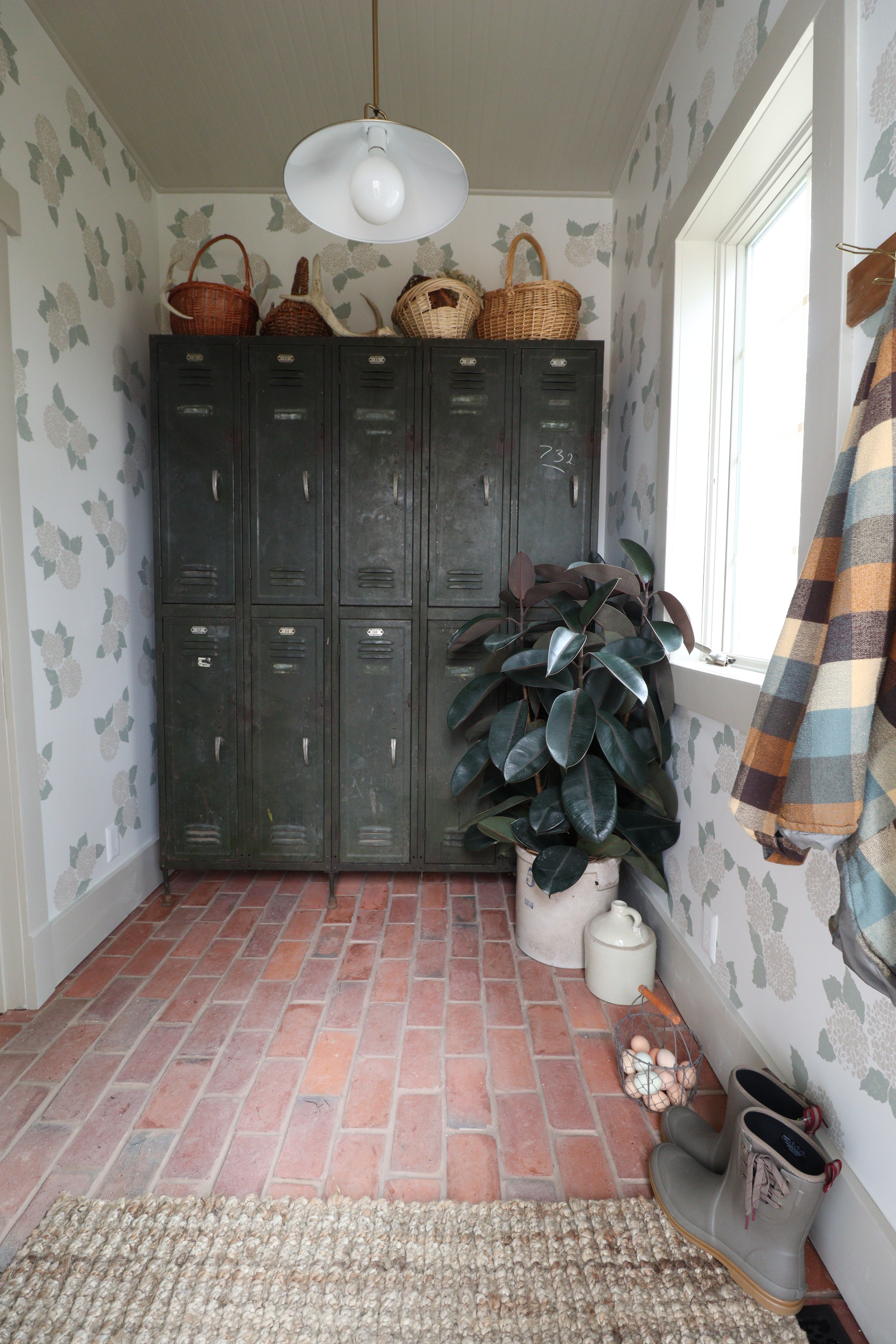 This one’s from a while back but I still love it — brick floors, vintage lockers, and muddy boots. Linked everything I could (or close enough) here 👇 

 #LTKHome