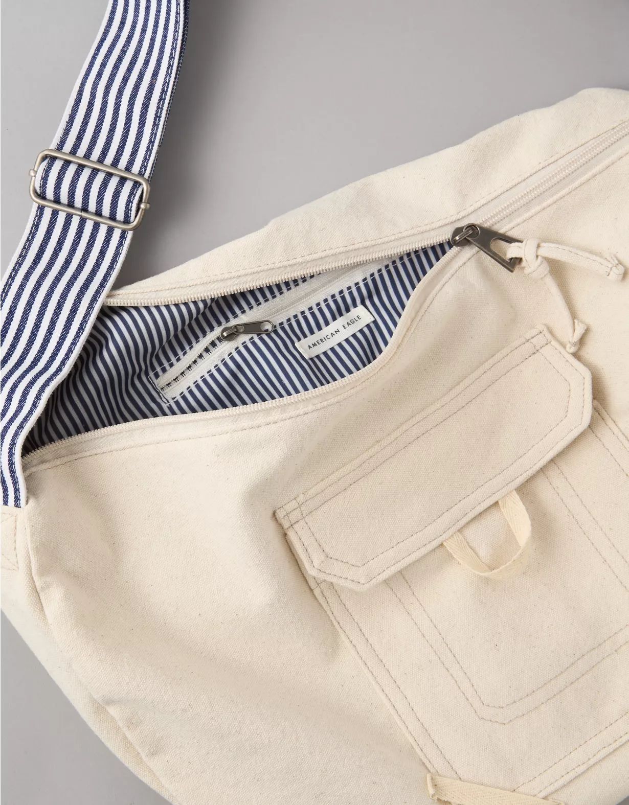 AE Oversized Utility Sling Bag | American Eagle Outfitters (US & CA)