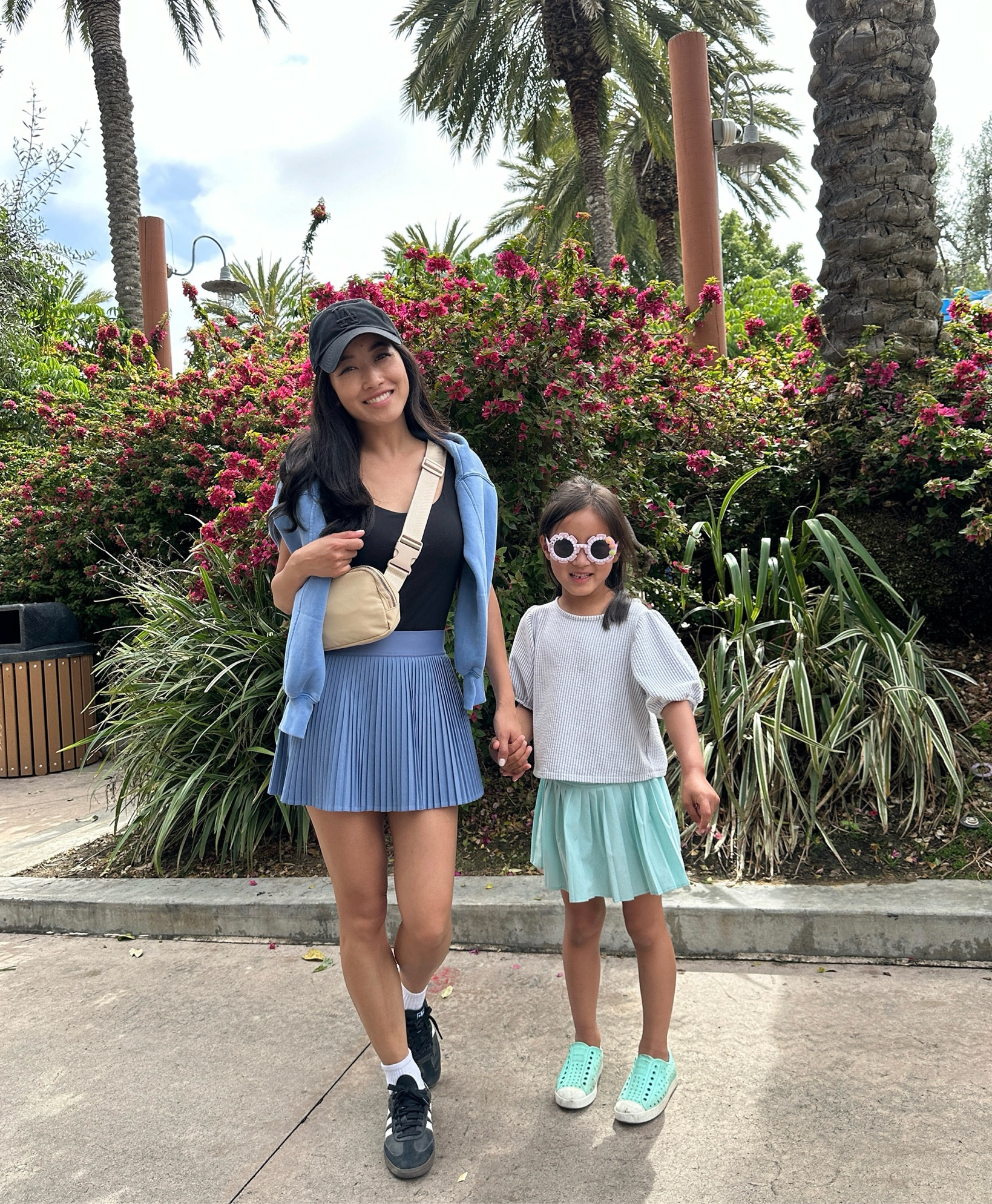 Comfy weekend casual mom outfit, also very practical for a day at a theme park / Disney. 

• Lululemon skirt size 2 - built in shorts and pockets under! Super cute and petite friendly 

• nori is in Abercrombie kids skort which she loves!! Washes well too 

• Abercrombie sweatshirt xxs - very comfortable and has pockets as well

• Uniqlo tank top xxs 

• Amazon belt bag

• Amazon socks 

• Adidas sambas men’s 4 = women’s 5

• 47 brand hat 

#petite friendly weekend outfits 

#LTKkids #LTKtravel 

#LTKFamily #LTKTravel #LTKActive