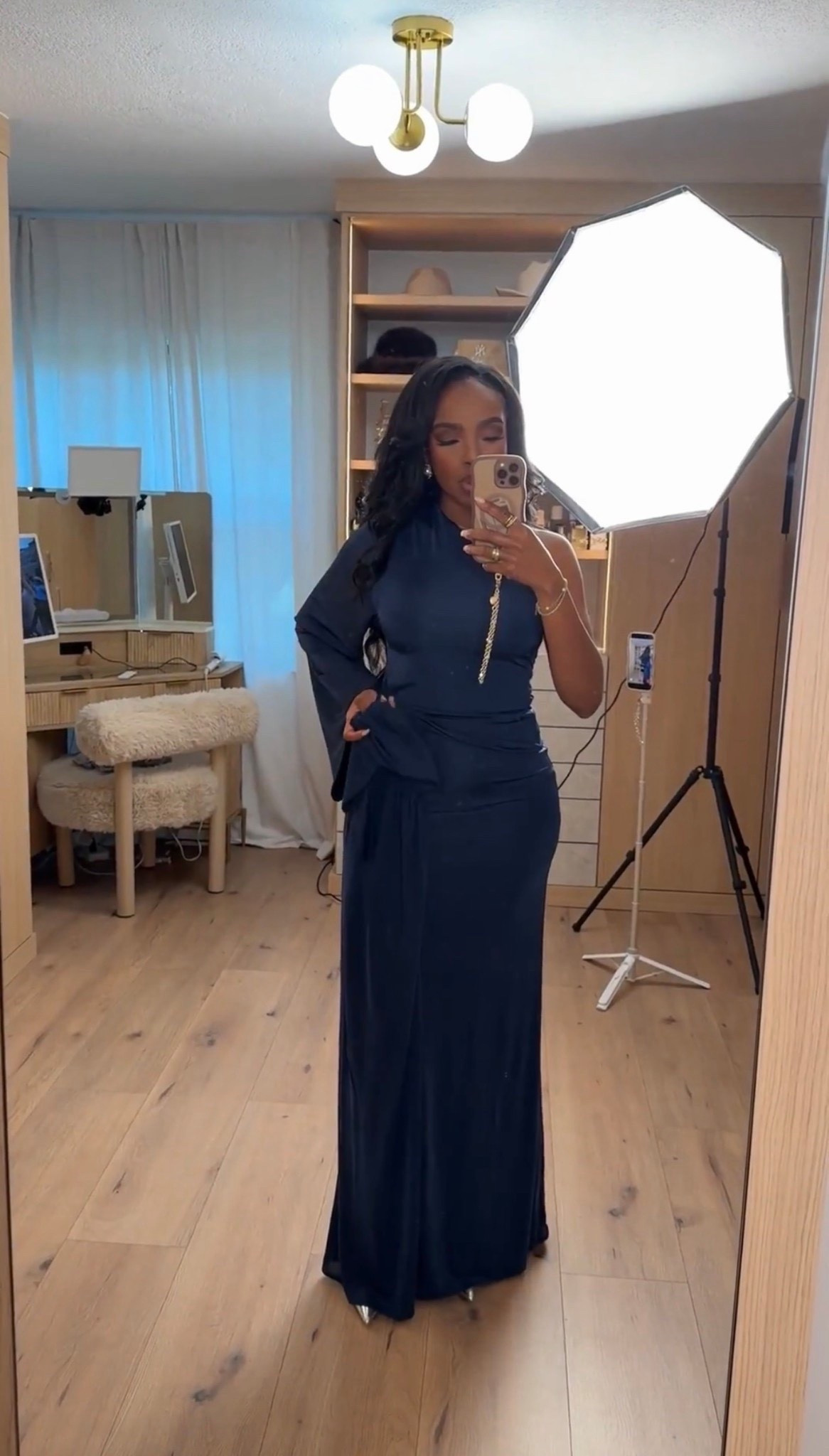 Cost per wear magic ✨ This sleek black maxi set is the kind of outfit that works overtime in your wardrobe—dress it up, dress it down, and every wear makes it more worth it. One of those pieces where the cost per wear drops fast because it’s timeless, flattering, and endlessly versatile.

The draped silhouette creates an effortlessly elevated look while still feeling comfortable and wearable. Style the top separately with denim or trousers, or wear the skirt with a fitted knit or blouse for multiple looks from one set.

Perfect for date nights, dinner events, holiday parties, special occasions, and elevated evenings out.

📏 Sizing:
Top: Small  
Skirt: Small  
Shoes: True to size  
Measurements: 5’4” · 138 lbs · 34D · 27” waist · 40” hips

Tap to get details and shop this look instantly.

Black maxi outfit, elevated evening style, versatile two-piece set, cost per wear wardrobe staples, timeless black outfit ideas.

Follow me on Instagram and YouTube @kirasfashionfinds

#LTKootd #LTKgrwm