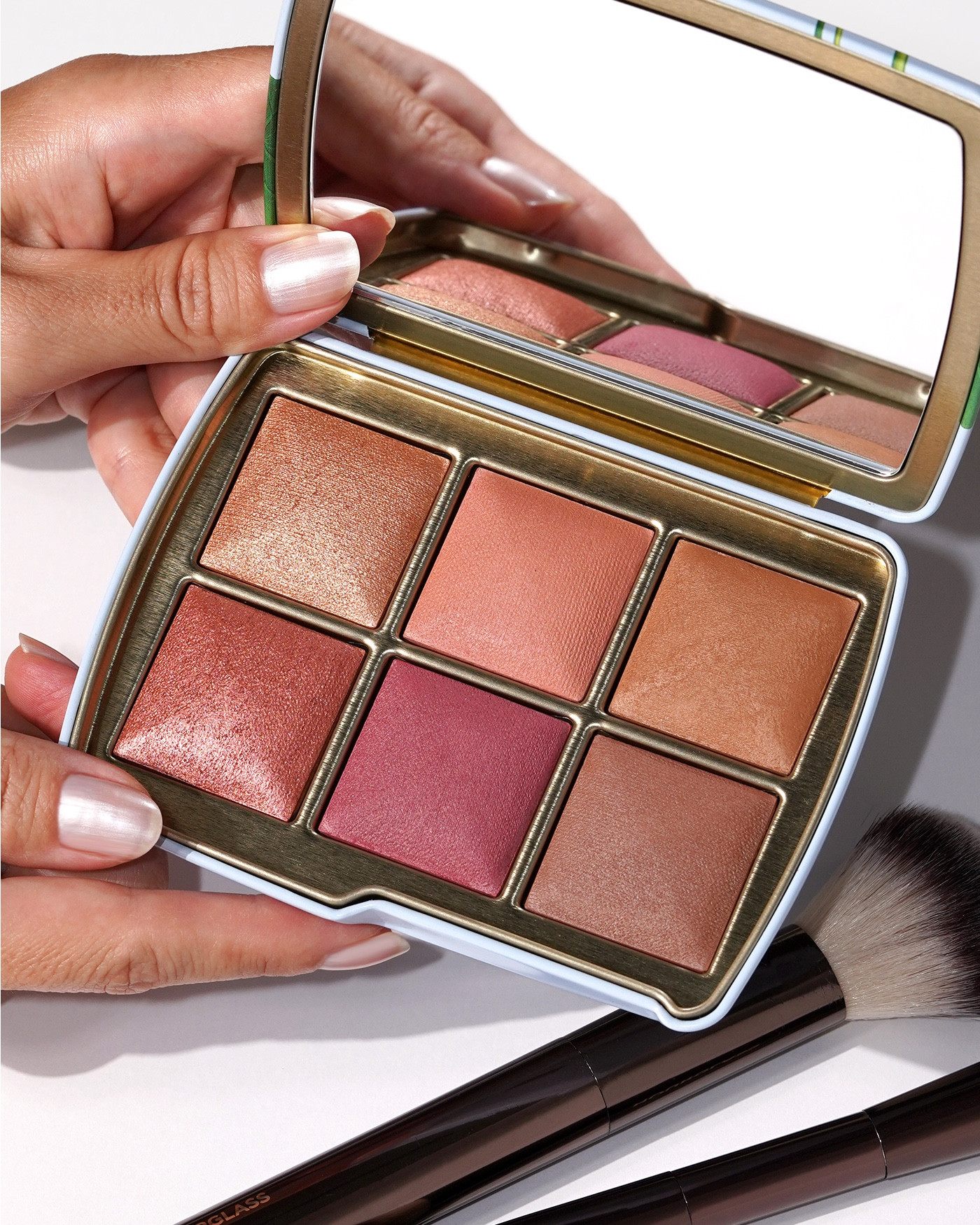 Hourglass Holiday 2024 palette with new shades

Gilded Strobe Light Ambient Strobe Lighting Powder – a stunning warm golden shimmer

Desert Flush Ambient Lighting Blush – burnt peach

Eternal Light Ambient Lighting Finishing Powder – warm amber tan

Radiant Rose Strobe Light Ambient Strobe Lighting Powder – metallic copper rose shimmer

Red 0 Ambient Lighting Blush – deep berry pink

Bronze Heat Ambient Lighting Bronzer – deep bronze

#LTKBeauty