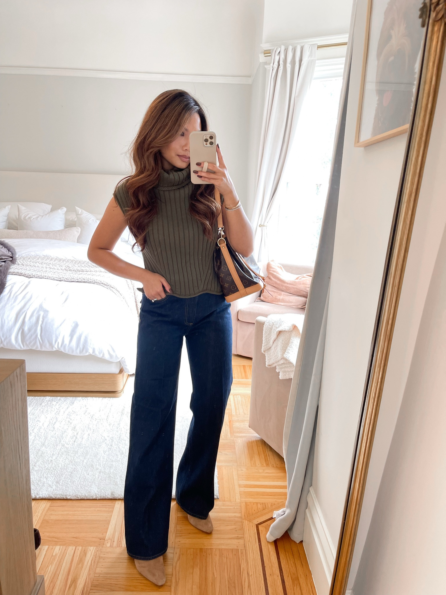 Love this casual fall look! Great for a transitional fall look with the sleeveless turtleneck sweater

Sizing:
Top - tts, xs
Pants - tts, raw bleu martini wash, 25 
Booties - sized up 1/2 size 

#LTKFindsUnder100 #LTKPetite