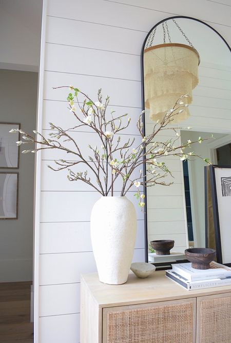 Best faux stems, faux branches, faux quince branch, faux blooms, white blooms, white vases, foyer decor, entryway decor, home decor, coffee table books, home accessories, beaded chandelier, arched mirror 

#LTKsalealert #LTKstyletip #LTKhome