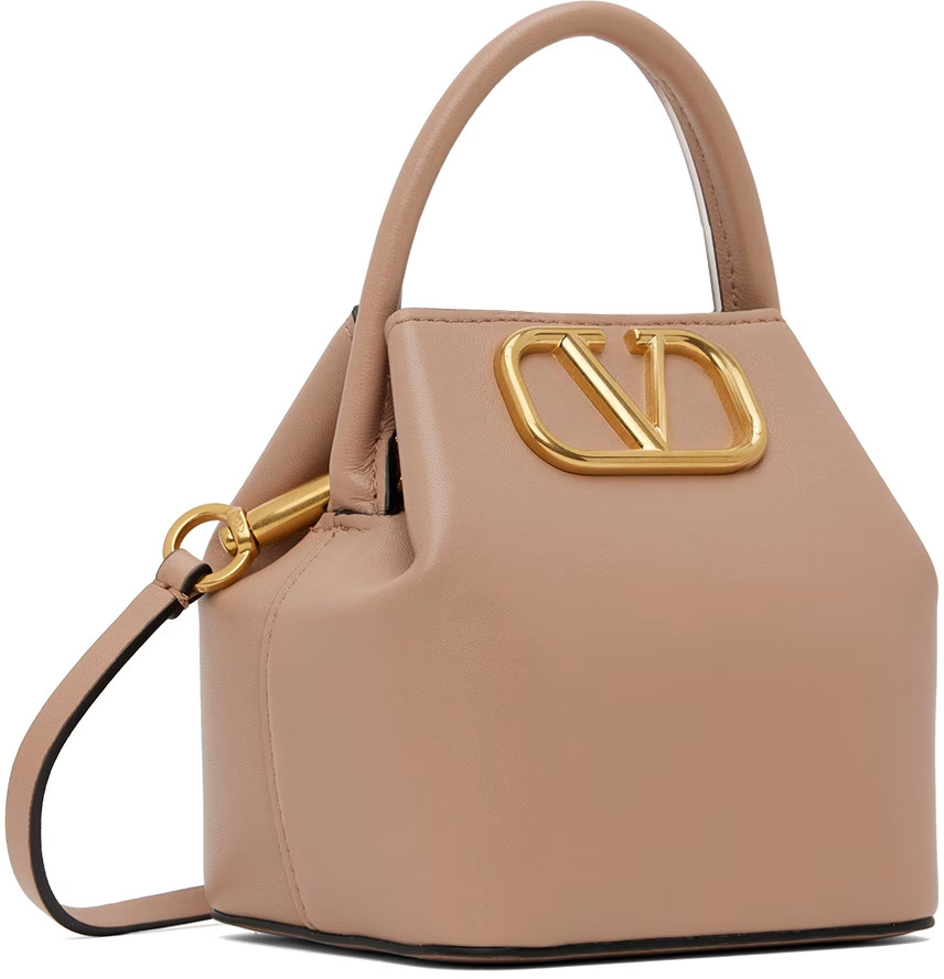 Valentino Garavani
                 
                Pink Mini VLogo Bucket Bag
                
... | SSENSE