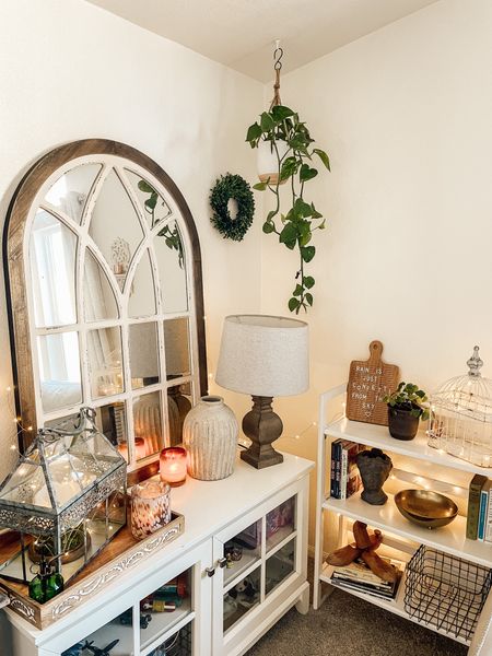 Living room refresh 🤍 #homedecor #archmirror #pottery #cozyhome #cozyhomedecor 

#LTKFind #LTKhome