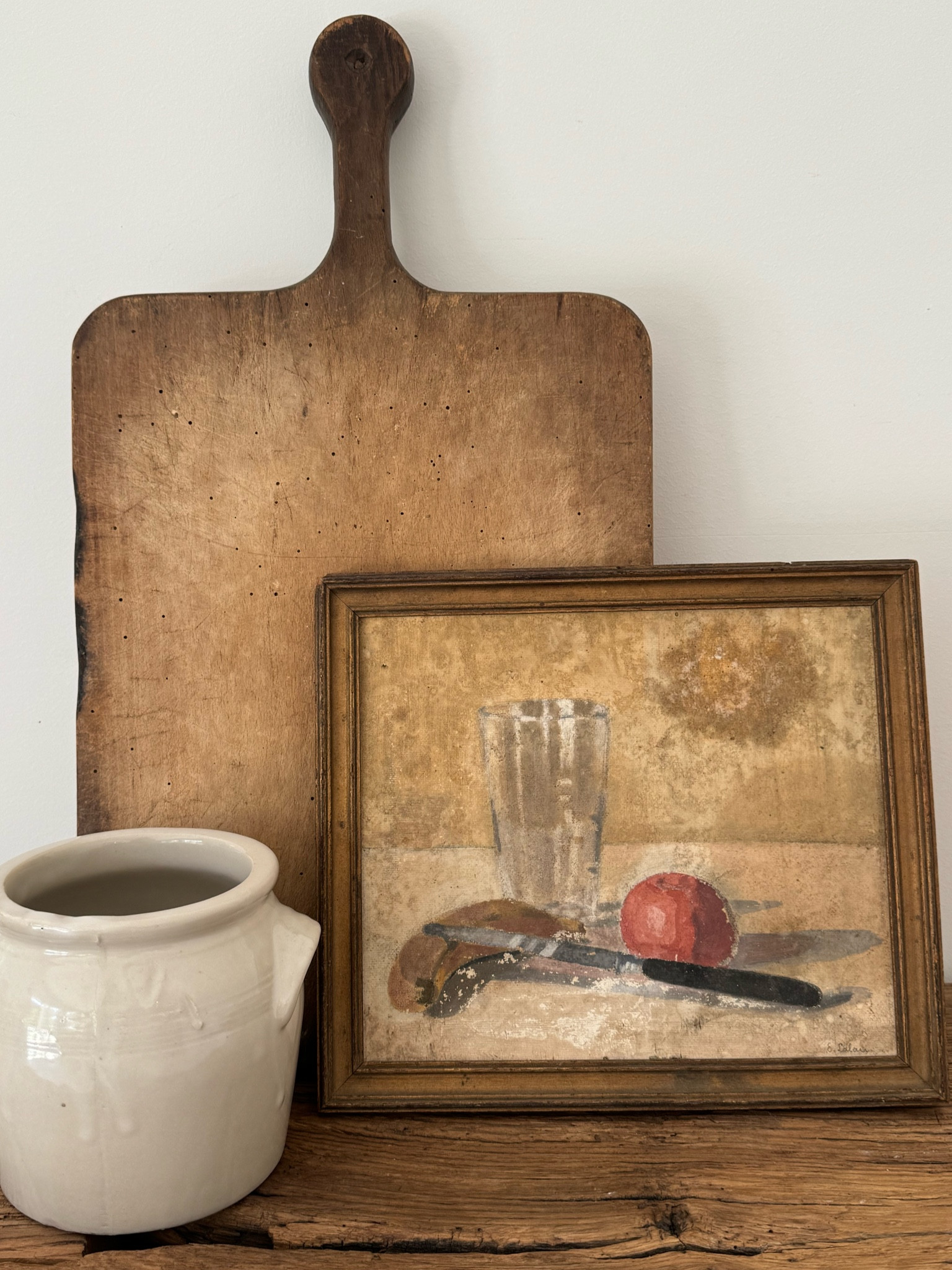 One of my favorite finds lately — a mid-century French still life with the most beautiful timeworn surface and muted palette.

The kind of piece that instantly makes a shelf, kitchen corner, or gallery wall feel more layered and lived in. Signed, beautifully aged, and still housed in its original worn gilt frame with historic backing intact.

Found in France and now available through Our Nido.

#LTKhome #FrenchDecor #CollectedHome #VintageArt #EuropeanInteriors #FrenchCountryStyle #GalleryWall #MidCenturyDecor #MoodyInteriors #OurNido

#LTKHome