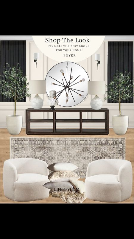Transitional, mid century modern, modern farmhouse foyer design ideas. Black console table, white accent chairs, traditional rug, creme beige throw blankets and pillows, white tree planter pot, black wall sconce light, foyer chandelier, round mirror, white female bust decor, white table lamp, realistic fake tree, black wall panels.

#LTKhome #LTKstyletip #LTKFind