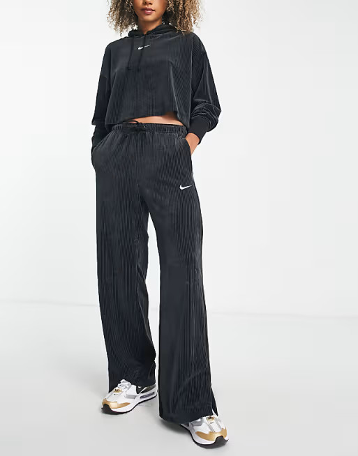 Nike velour wide leg pants in blackwindow.asos.performance.markAndMeasure(`pdp:title_displayed`);... | ASOS (Global)