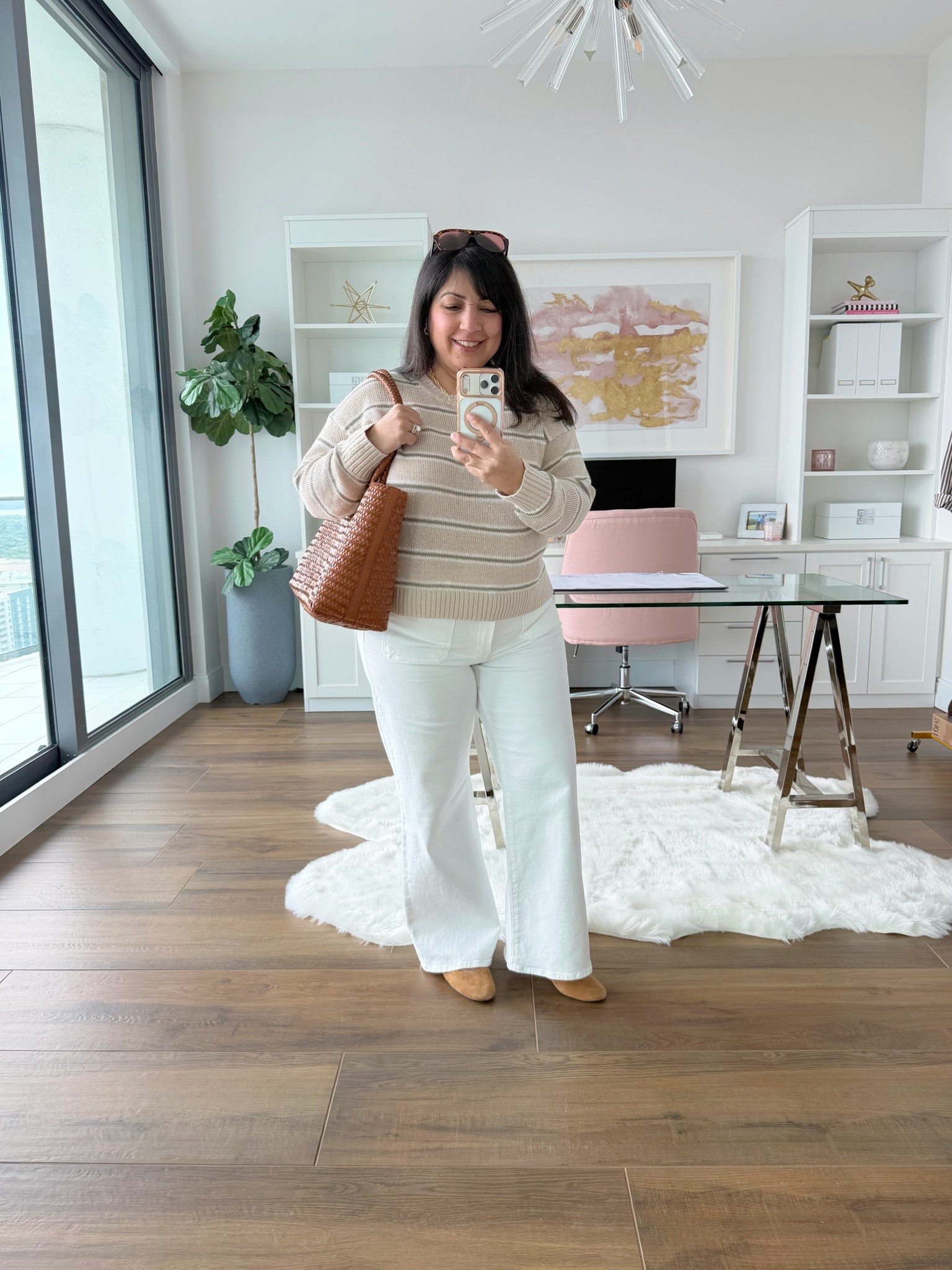 If you’re midsize and petite and looking for white jeans for this spring and summer that are stretchy, comfortable, flattering and not see-through, I definitely recommend giving this pair a try! They’re work appropriate too if you can wear jeans to work!

Madewell striped linen sweater size large. Madewell white wide leg jeans size 32 Short. Madewell Remy brown suede Mary Jane ballet flats. Madewell woven leather tote bag. Madewell aviator sunglasses.

Spring outfits 2026. Workwear outfits. Business casual workwear. Work outfits. Jeans for work. Summer outfits 2026. Travel outfits. 

@Madewell 

#LTKPetite #LTKWorkwear #LTKMidsize