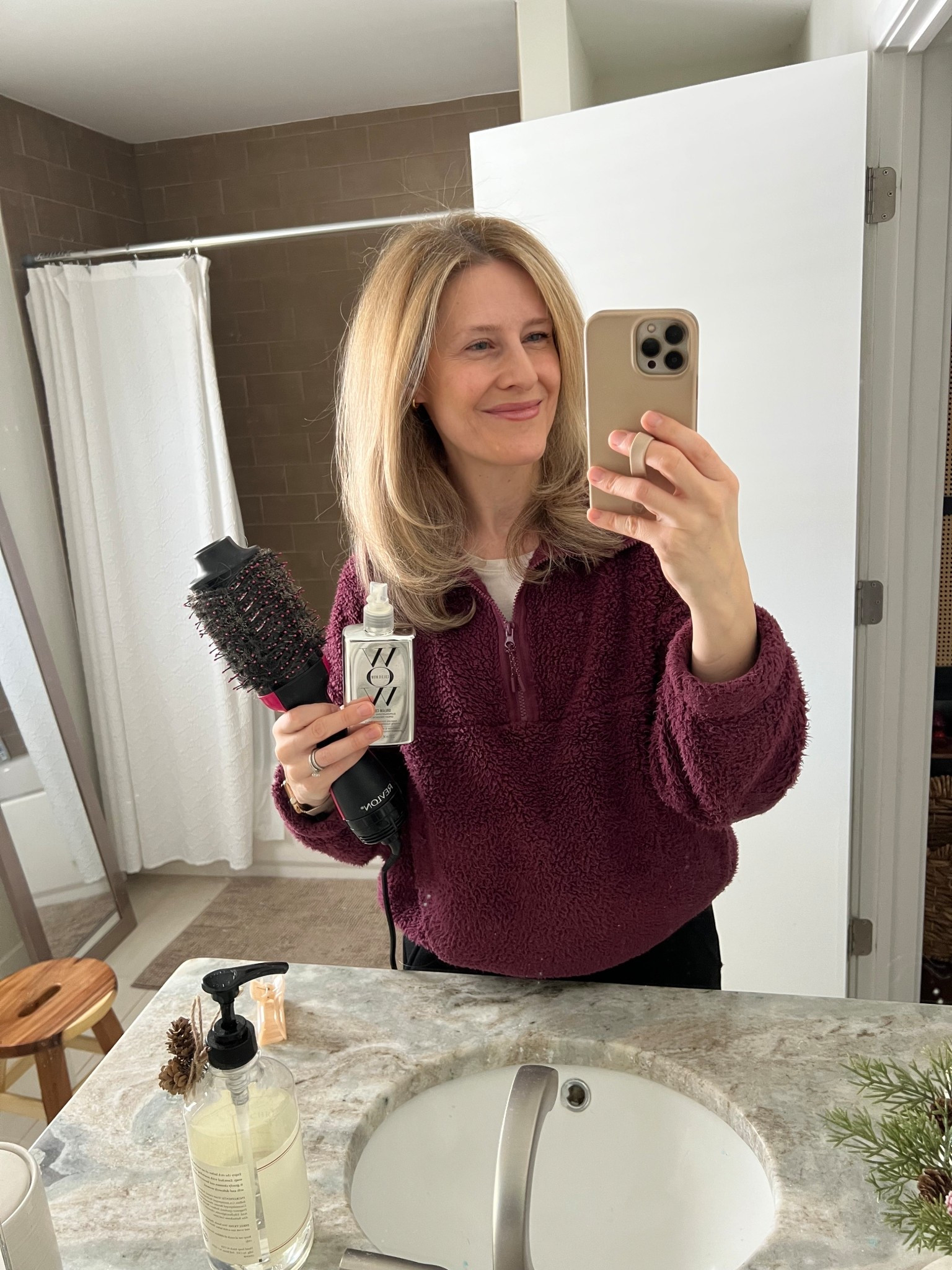 How I get a salon-style blowout at home! Saturate towel dry hair with Color Wow. Blow dry hair in sections with tension until completely dry and smooth using the Revlon Blow Dry Brush. My hair is naturally curly/wavy and color treated (about 75% gray without). #beauty 

#LTKBeauty #LTKOver40