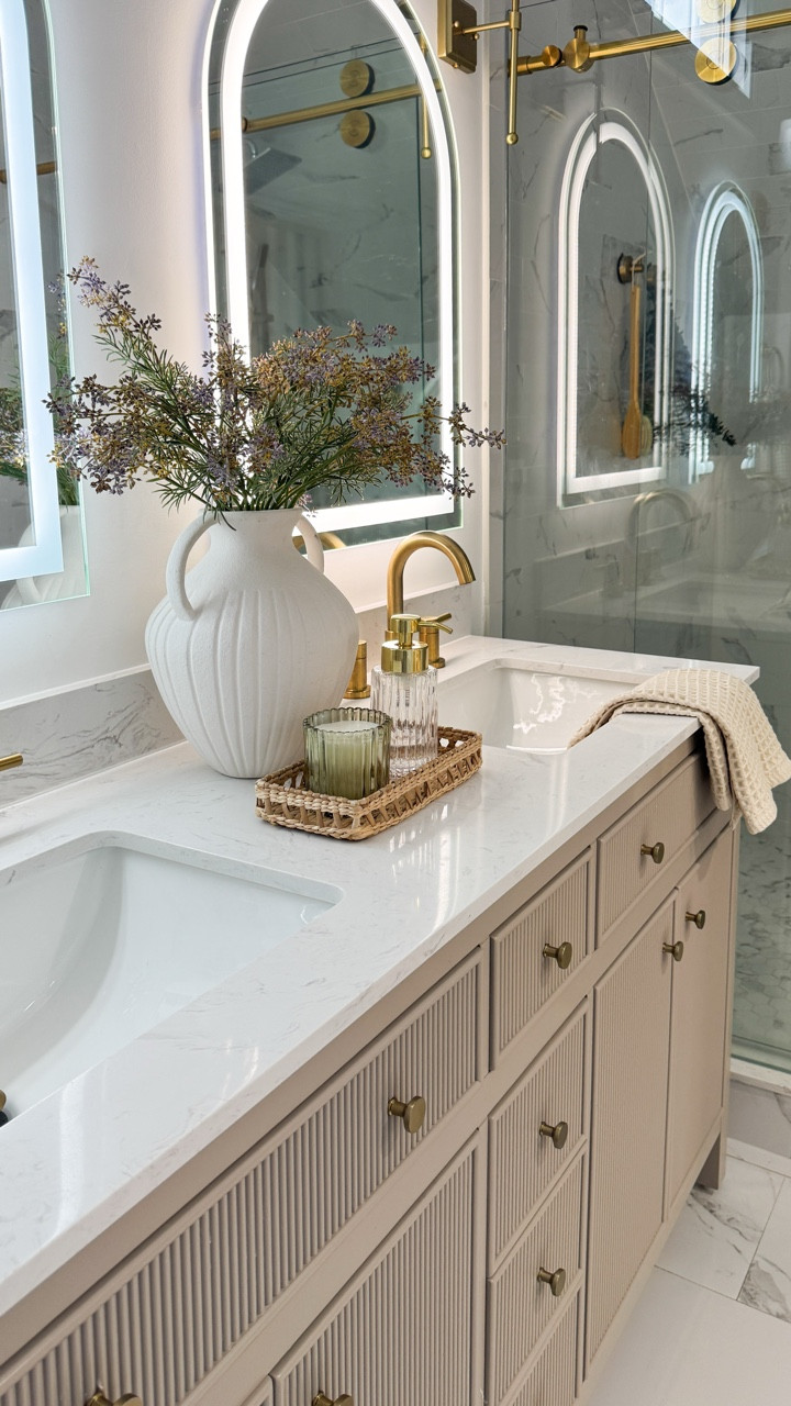 Lowe’s for the win. This stunner is under $1100 and comes in multiple sizes (30”, 36”, 48”, and 60”) with prices starting at just $499.
Marble top, fluted detailing, and brass hardware… it looks designer without the designer price tag. 🙌🏼



#LowesFinds #BathroomInspo #NeutralBathroom #FlutedVanity #VanityGoals #ModernOrganicHome #BathroomGoals #BathroomRefresh #BudgetFinds #CozyHome #LTKHome

#LTKHome #LTKSaleAlert #LTKStyleTip