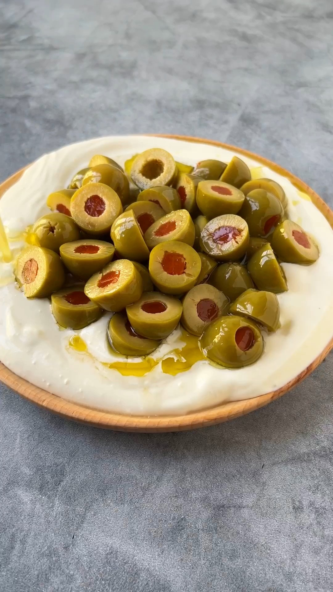 Christmas App Idea 

Ingredients
* 10 oz cold cream cheese
* 1/2 oz cold sour cream
* 2 oz blue cheese
* 1 oz gin plus more for marinating
* 1 oz olive brine plus more for marinating
* 8 oz martini olives halved
* Kosher salt
* 3 tbsp extra-virgin olive oil

Instructions 
* In a small bowl, combine the olives, olive oil, a splash of gin, and a splash of olive brine. Toss to combine and marinate until ready to serve. 
* In a food processor, combine the cream cheese, sour cream, blue cheese, gin, olive brine, and a pinch of salt. Blend until smooth and creamy (it’s okay if some blue cheese chunks remain). 
* Transfer the dip to a serving plate or shallow bowl and spread into an even layer. Top with the marinated olives and spoon over as much marinade as you like. Serve immediately. 


https://ainttooproudtomeg.com/dirty-martini-dip-with-olives/

#LTKHoliday #LTKHome #LTKSeasonal