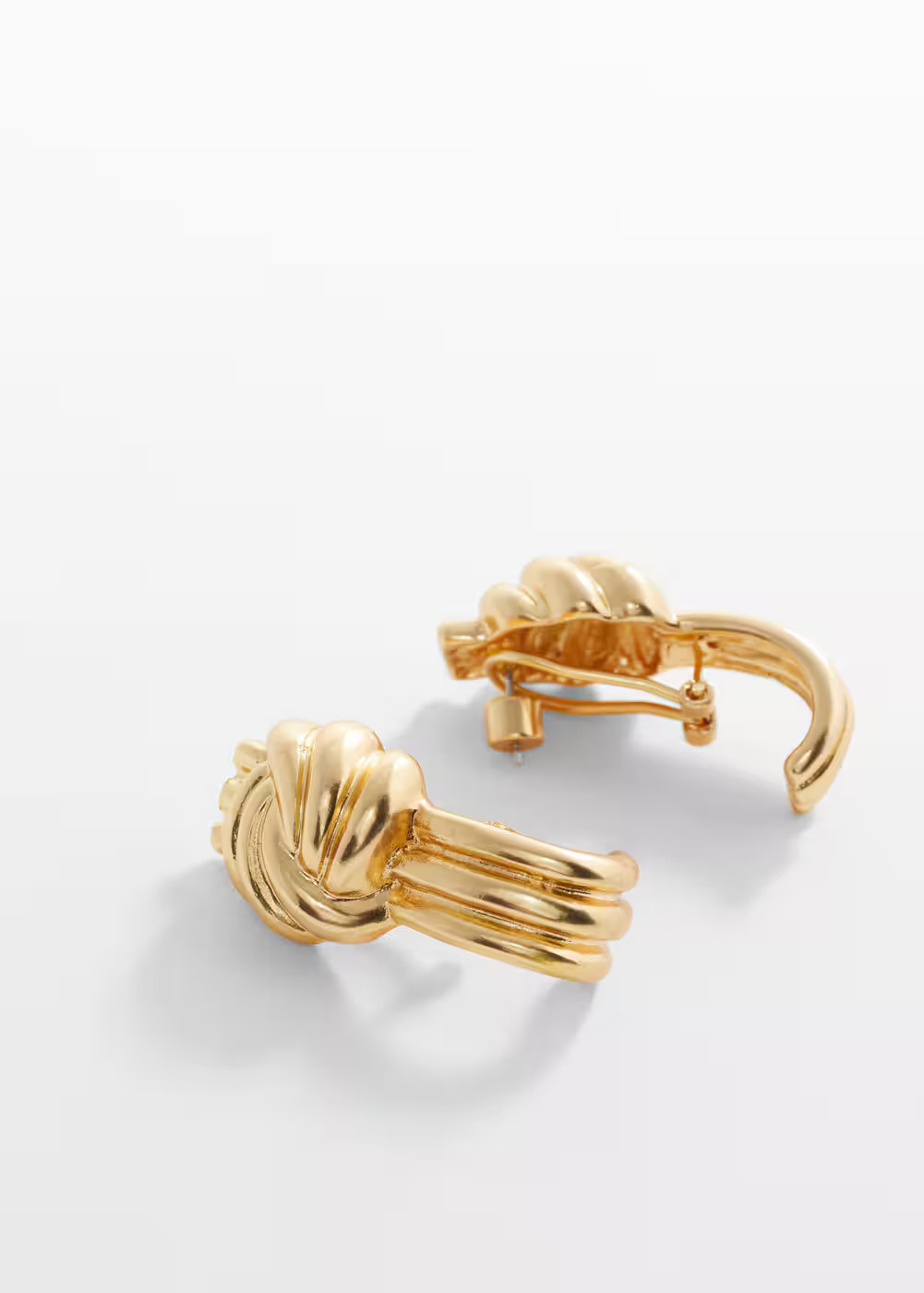 Intertwined design earrings -  Women | Mango United Kingdom | MANGO (UK)