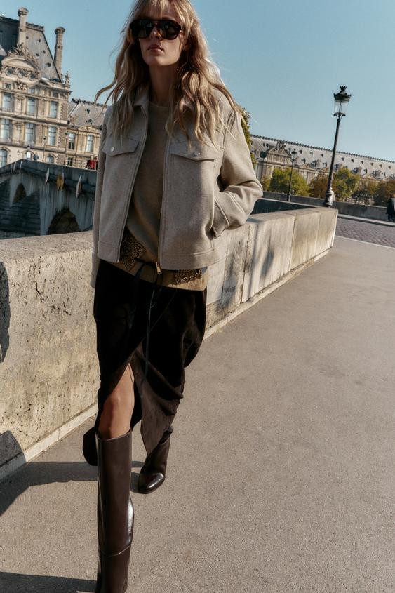 Jacket with lapel collar and long sleeves. Front pockets. Front zip closure. | Zara US