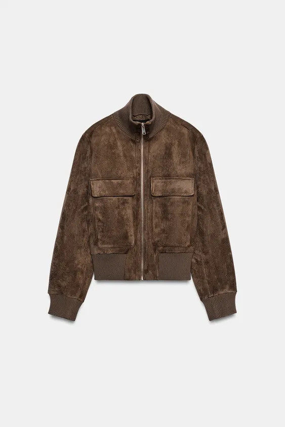 Bomber-style jacket with a high collar and long sleeves. Featuring front patch pockets with flaps... | Zara UK