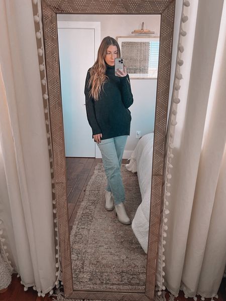 Amazon find! Affordable oversized turtleneck sweater. This sweater is a keeper! I’m wearing a size small, it’s soft, the sleeves are long enough, it’s slightly oversized, and it’s long enough to cover the butt! All for under $50

#LTKstyletip #LTKunder50
