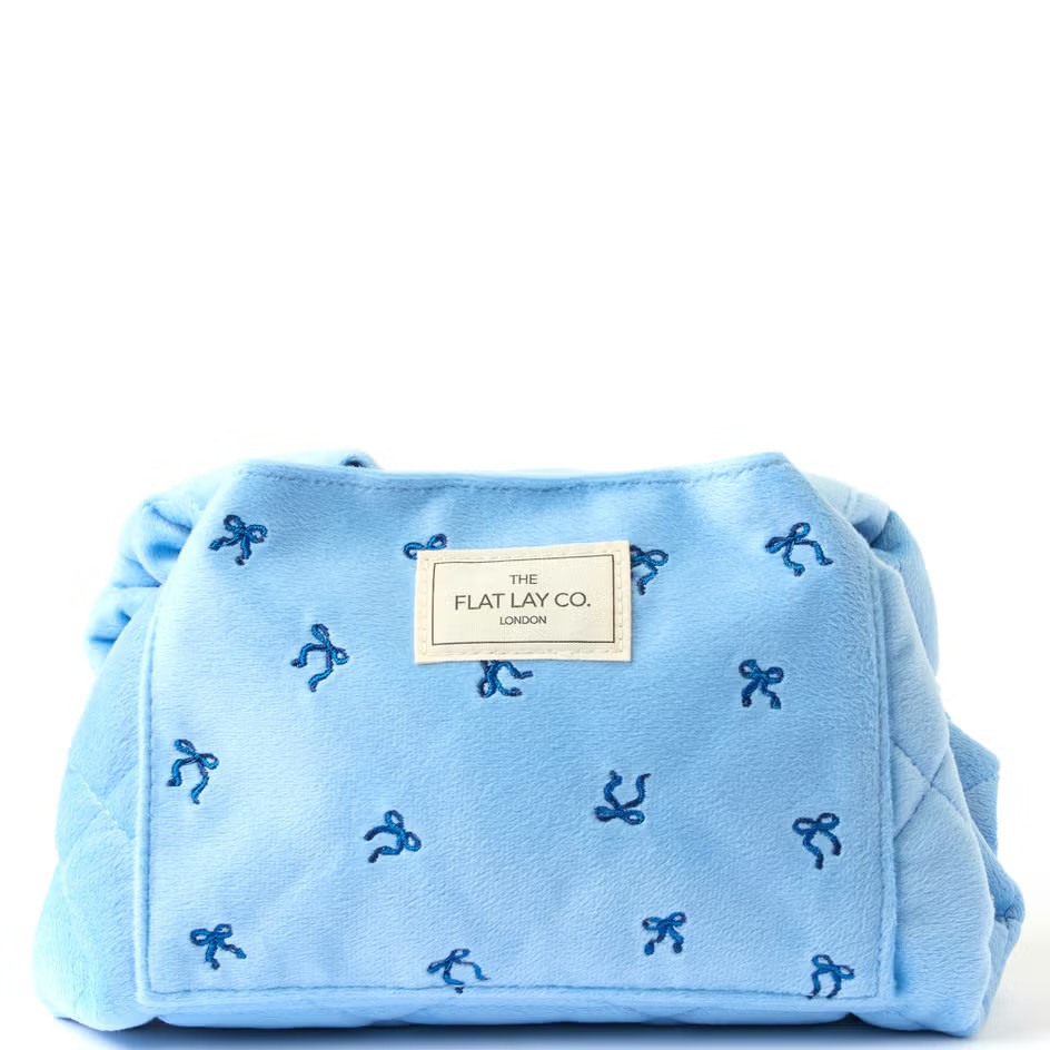 The Flat Lay Co. Drawstring Flat Lay Makeup Bag - Ditsy Bows Blue Embroidered Velvet | Look Fantastic (UK)