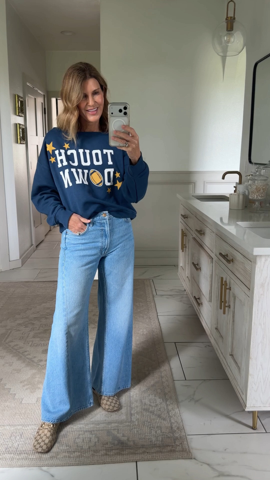 I sized up to a large touchdown sweatshirt

#LTKOver40 #LTKootd