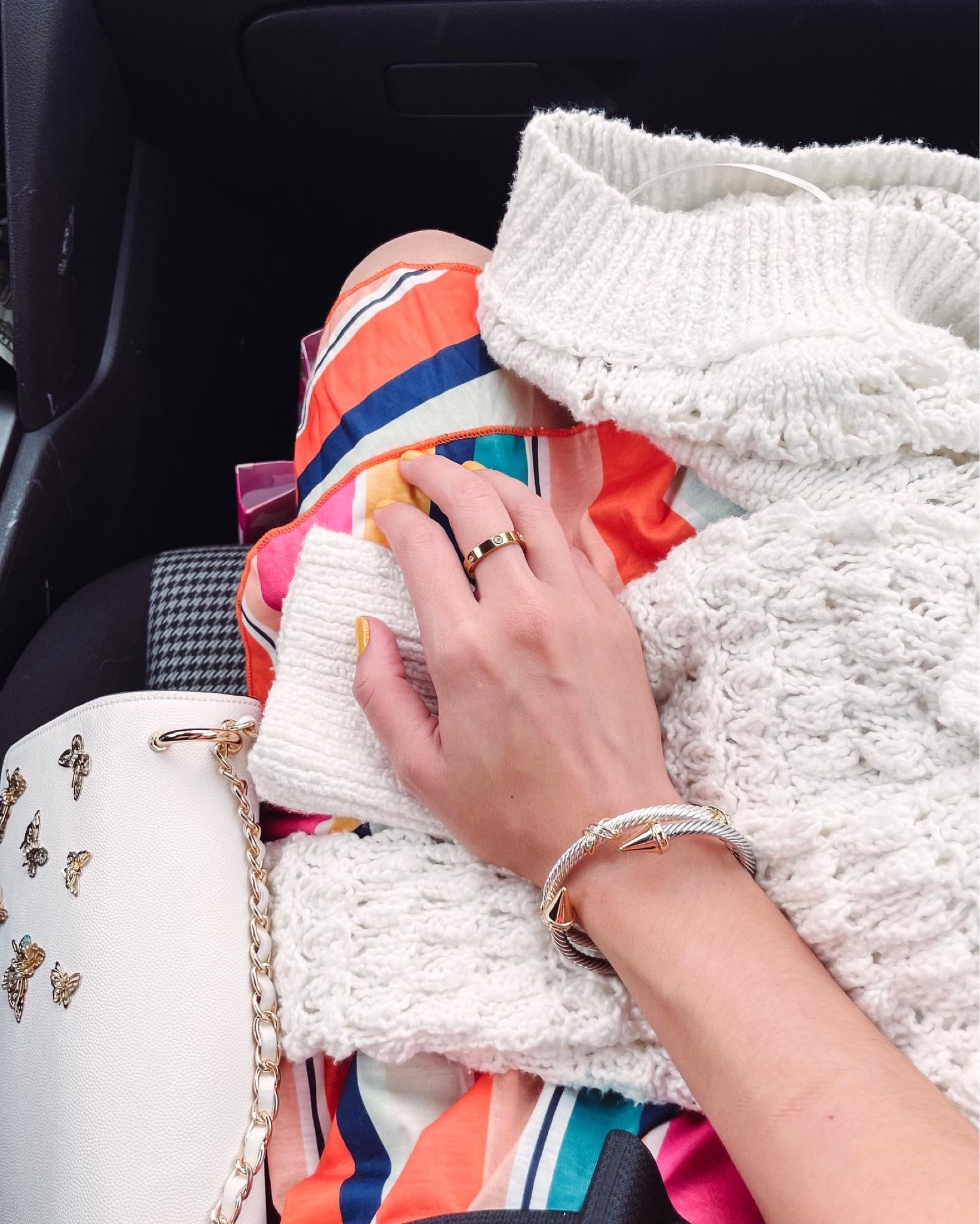 Summery details
Amazon fashion striped colorful mini dress, designer inspired silver and gold bangle bracelets (similar to David yurman), free people crochet sweater, and aldo butterfly shoulder bag.  

#LTKstyletip #LTKSeasonal #LTKunder50