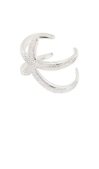 Ettika Starfish Hug Cuff in Metallic Silver. | Revolve Clothing (Global)