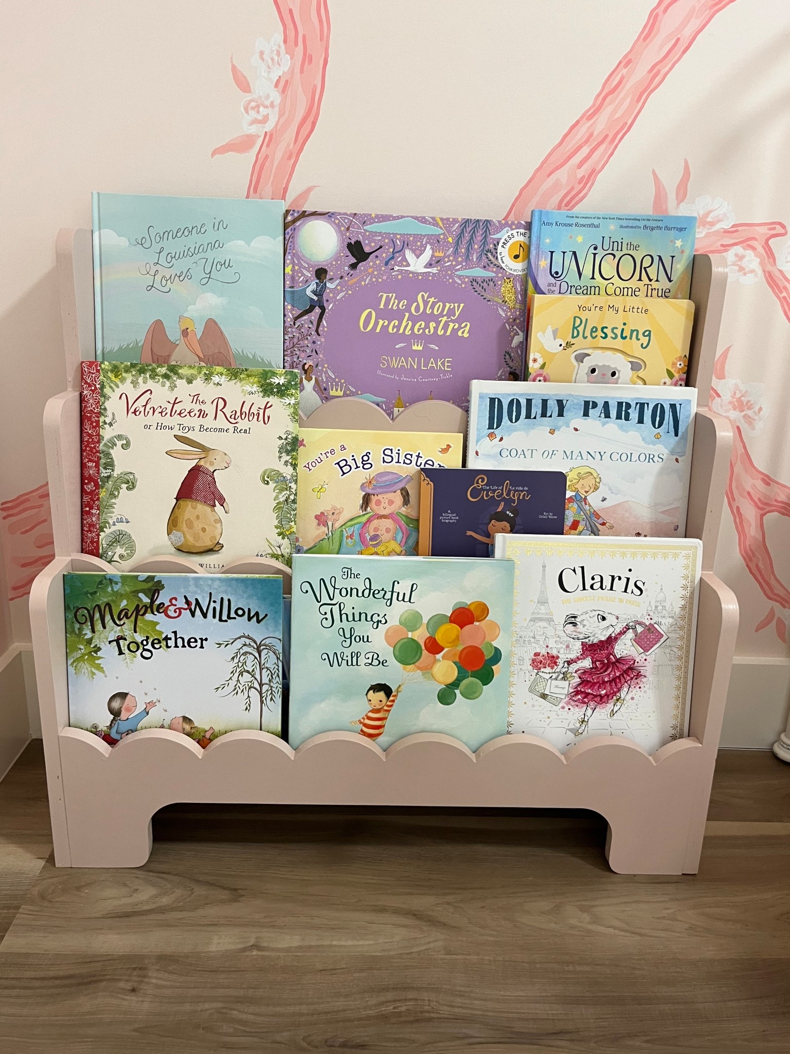 We ordered this wooden bookshelf for our girls room because our house is overflowing with books! Painted it Sherwin Williams “Sashay Sand” 


Scalloped bookshelf, nursery room, playroom, kids playroom, book storage, scalloped shelves 

#LTKKids