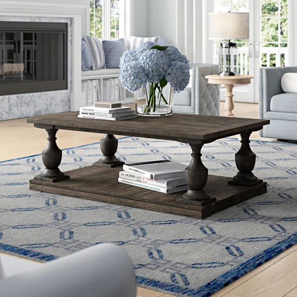 Shameka Solid Wood Floor Shelf Coffee Table with Storage | Wayfair North America