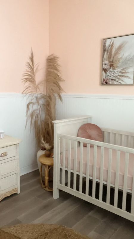My baby girl’s nursery 💓 Obsessed with how it turned out! The dresser is vintage (pier 1 from the 1990s), linked everything else I could find! The 3 pictures above her crib are from Hobby Lobby and I made the boho wall hanging (check it out on my page). Boho girl nursery, Girl nursery, nursery design

#LTKhome #LTKfamily #LTKbaby