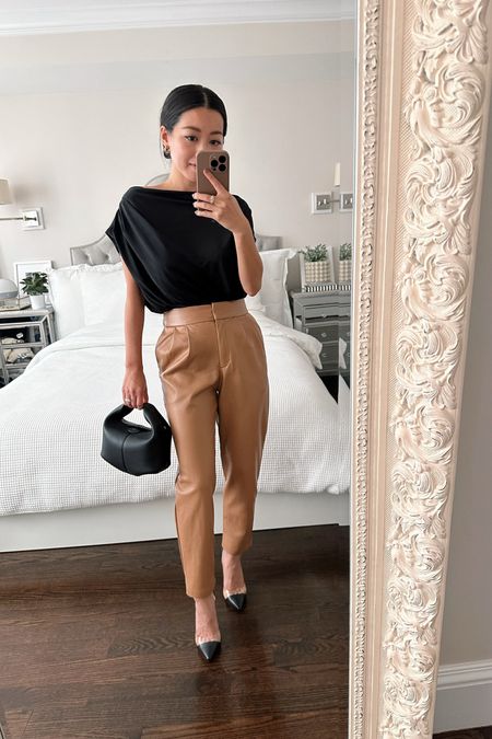50% off Express // camel / butterscotch faux leather ankle pants 

•Express faux leather ankle pants 00 short - in 3 colors, 00 petite and 00 short fit exactly the same in these
•Express top xs - fits loose on me, would prefer xxs
•Polene bag
•Similar shoes linked 

#petite

#LTKunder100 #LTKSeasonal #LTKstyletip