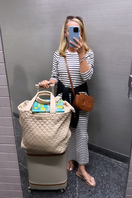 My favorite travel look 
Long sleeved stripe tshirt dress 
Spanx air essentials half zip
Best carry-on suitcase  Paravel aviator plus 
Best carry-on tote  bag MZ Wallace large metro tote deluxe
Celine, small brown leather Crossbody bag 


#LTKstyletip #LTKSeasonal #LTKtravel