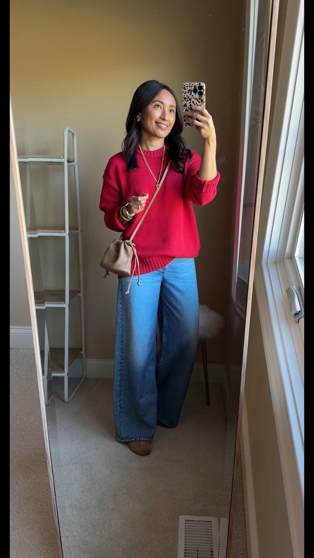 Holiday red, but make it casual. 
I love this classic red which is universally flattering. 
This is the perfect oversized 100% cotton sweater. I stayed true to size  It is available in multiple colors. 
I have had past seasons of their all cotton sweaters and still wear them. They wash and wear well. 
I plan on wearing this sweater mostly with jeans, but you could easily dress it up with black bottoms. 
Here I am wearing sweatpant jeans. 
Keeping the look casual with sneakers; would wear heeled booties for dress up. 
Gold jewelry looks great with this red. 


#LTKOver40 #LTKHoliday #LTKSaleAlert