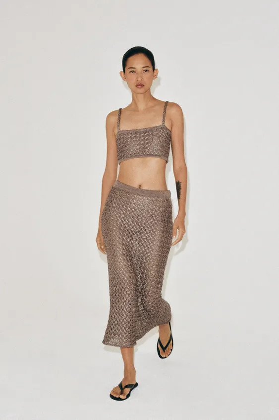 Open-knit top featuring a straight neckline and thin straps. Back button closure with matching bu... | Zara US
