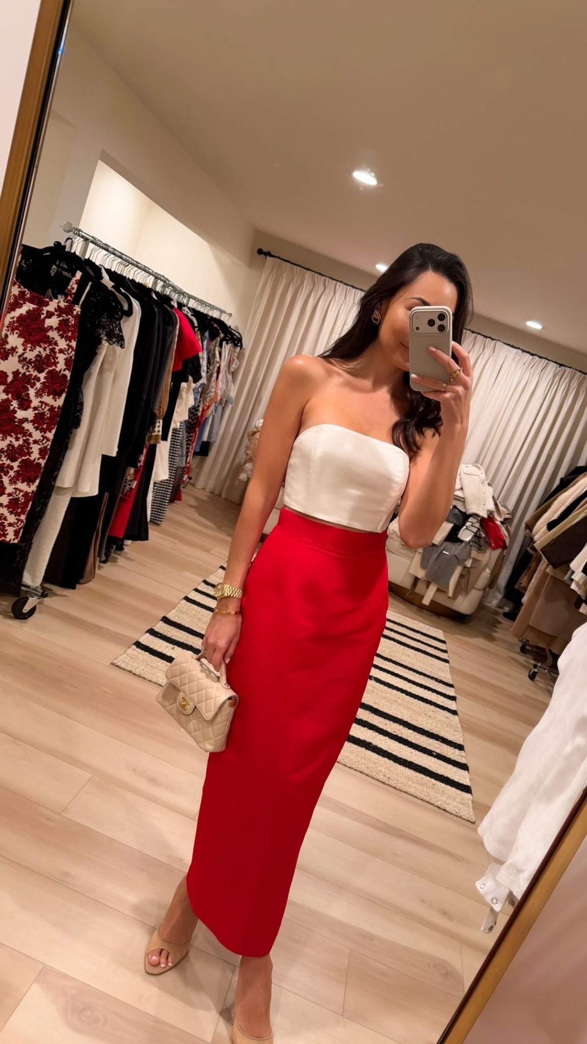 Red skirt and white silk top for holiday party. Holiday outfit, Alexia Maria, Chanel bag. 

#LTKHoliday #LTKParties #LTKItBag