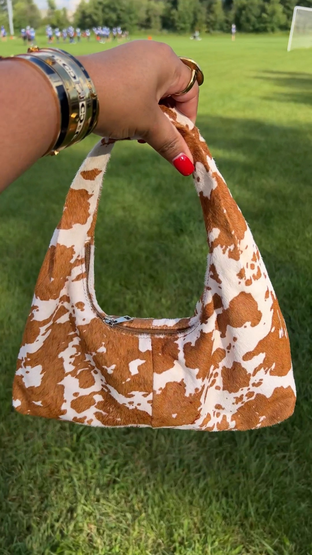 Cow print mini slouch bag. 

#LTKStyleTip