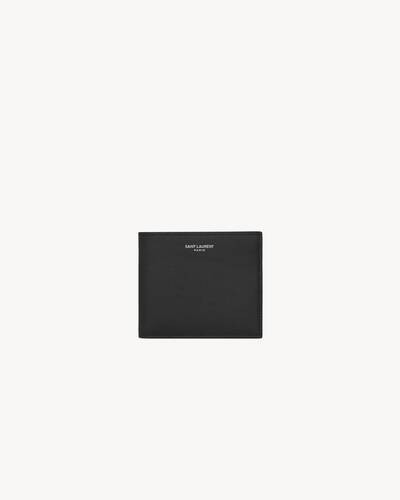 SAINT LAURENT PARIS-embossed single-compartment wallet made with metal-free tanned leather. | Saint Laurent Inc. (Global)