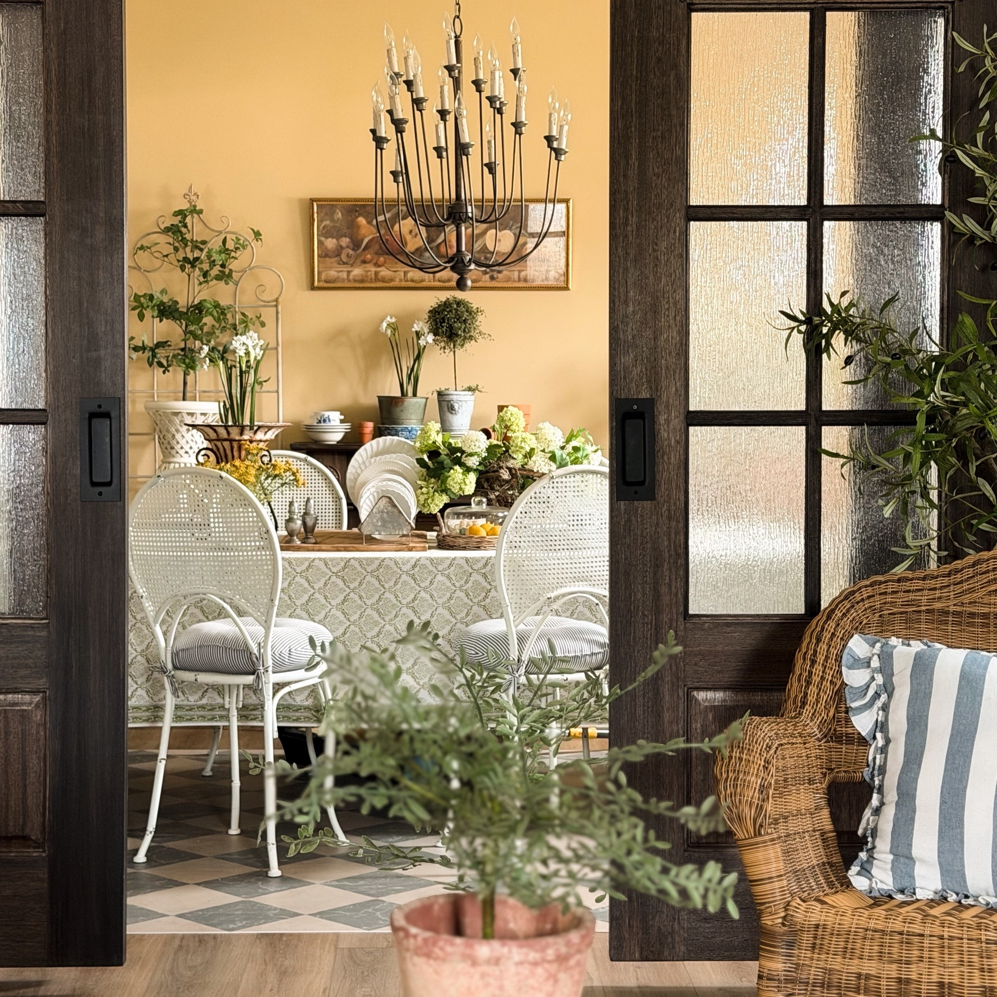 There’s something so special about gathering around a table that feels inspired by the garden itself. This week for The Garden House event with @antiquefarmhouse, I wanted our formal dining room to feel like an extension of the outdoors with collected greenery, layered florals, vintage inspired details, & soft cottage charm woven throughout the space.

The warm buttery walls in Blonde by Sherwin Williams continue to make this room glow throughout the day, especially paired with natural textures, wicker, ironstone, & fresh greenery scattered across the table. I love creating spaces that feel beautiful but still welcoming enough for everyday living.

One of my favorite details might just be the simple table styling. Layering pieces I already had on hand, mixing old with new, adding flowers from around the house, & letting the room slowly evolve over time into something that feels personal.

Happy Friday friend. 🤍 xo, Krystle

#LTKSeasonal #LTKHome