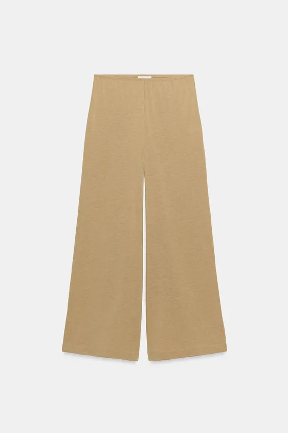 Pants made with 33% cotton yarn. Mid-rise with an elastic waistband. Wide leg. | Zara US