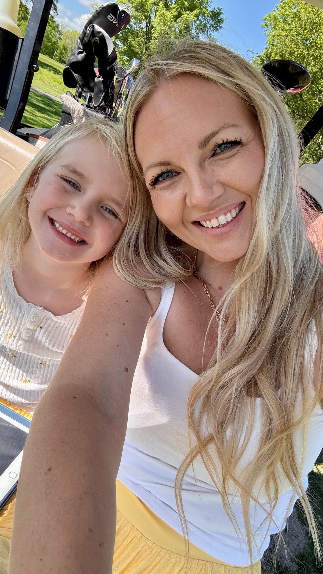 Ran across these adorable matching mommy and me skirts the other day and could not pass them up. This buttery yellow is beautiful and so fun! We could not wait to get out on the course to give them a twirl!
Mommy Daughter Golf || Matching skirt || athletic skort || golf outfit || fit check || golf course