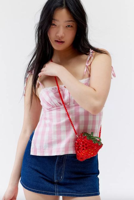 Obsessed with this beaded strawberry  crossbody bag from urban outfitters 

#LTKFestival #LTKmidsize #LTKfindsunder50