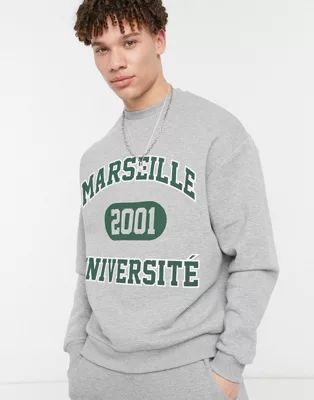 ASOS DESIGN oversized sweatshirt with vintage collegiate text print | ASOS (Global)